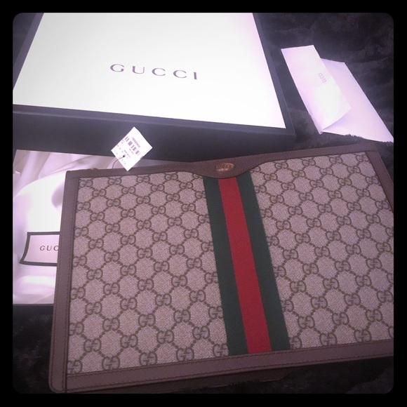 Gucci Handbags - Brand new never worn Gucci clutch